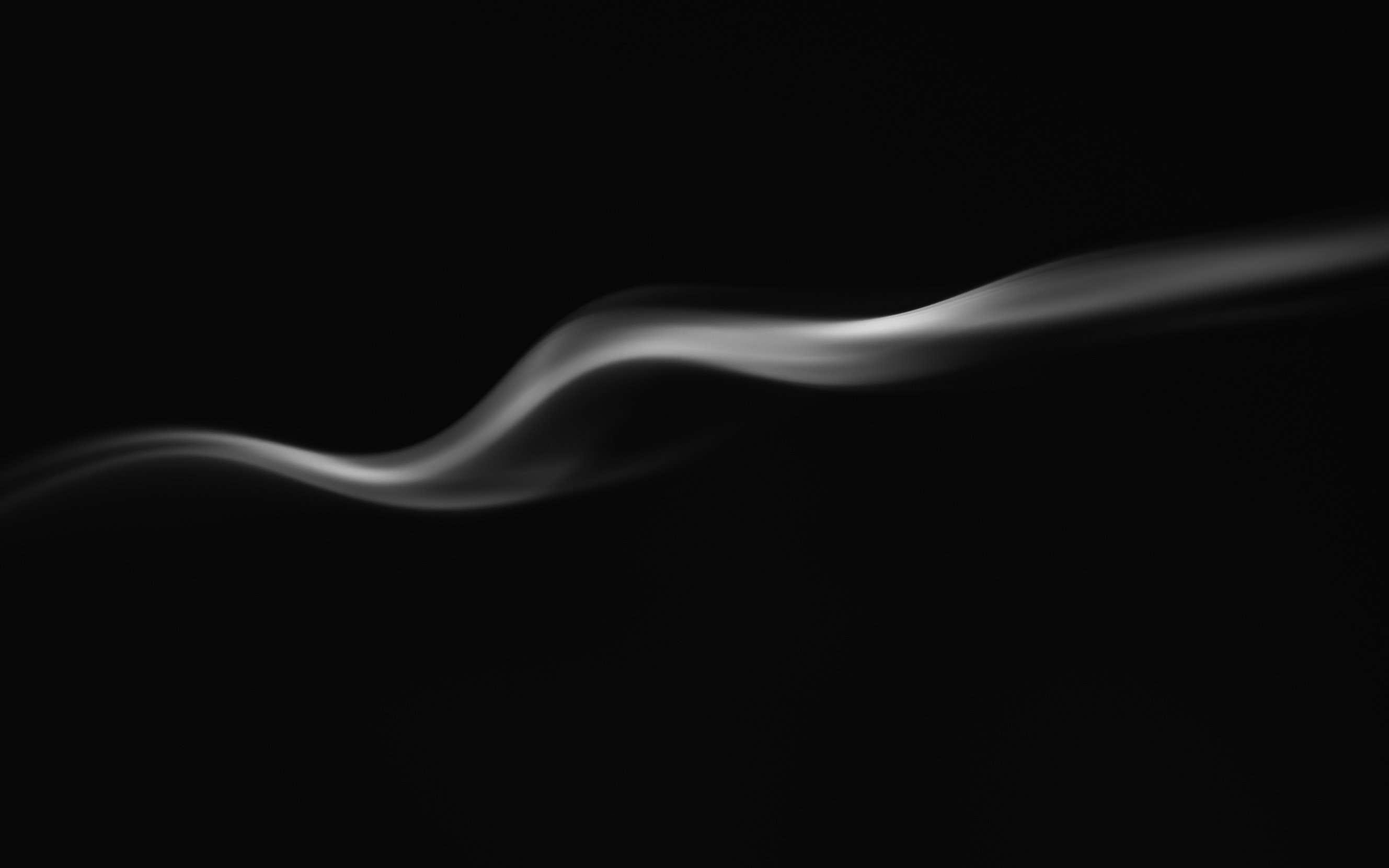 A White Smoke Floating on Black Background